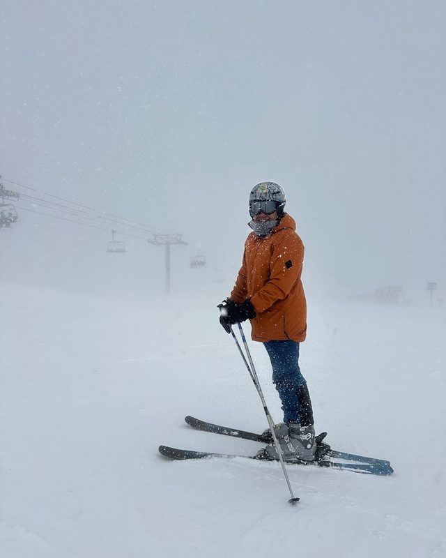 Ashwin on skis in a snowstorm